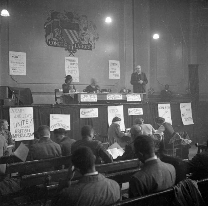 10th November 1945:  John McNair, General Secretary of the ILP (Independent Labour Party) addresses the first Pan-African Congress in Manchester. Also on the stage is Amy Jacques Garvey, the second wife of Marcus Garvey. Original Publication: Picture Post - 3024 - Africa Speaks In Manchester - pub. 1945  (Photo by John Deakin/Picture Post/Getty Images)